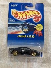 HOT WHEELS BLUE CARD COLLECTOR # 203 BLUE JAGUAR XJ220 GRAY INTERIOR W/ GLW