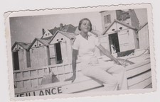 old photo ?️ woman beach boat 1930 wooden cabins snapshot vintage