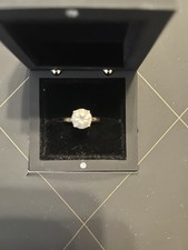 2 CT Round 4 Prong Simulated Diamond Nexus Alternative. 14 k Yellow Gold