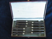 11 couteaux lame Acier inoxydable  et manche en corne .