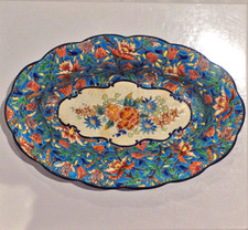 Plat ovale en émaux de Longwy Simone Masson, forme 3304, décor 5685 fond bleu