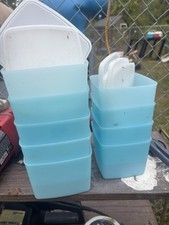 17 Tupperware containers with lids