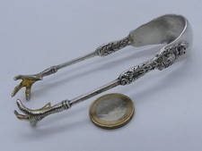 PINCE A SUCRE MEDAILLON HOMME DE PROFIL SOUS COURONNE ROYALE ARGENT MASSIF