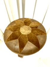 A vintage , leathe  pouf