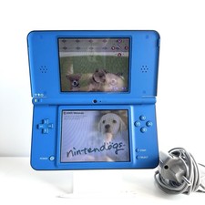 NINTENDO DSI XL BLUE + ORIGINAL NIB AND CHARGER TESTED AND WORKING