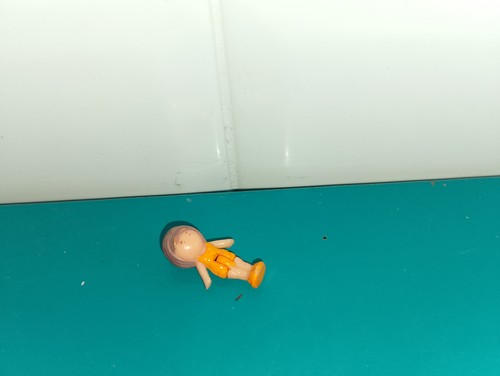 Polly pocket figurine doll