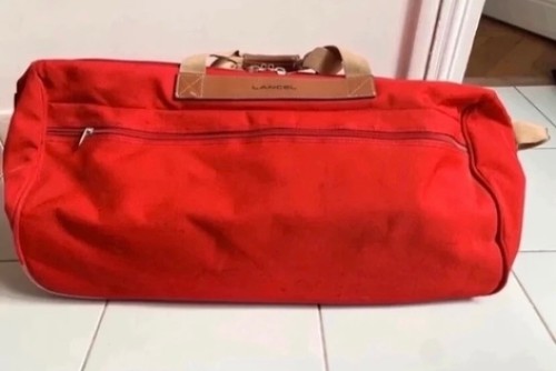 Sac voyage roulettes - à,
