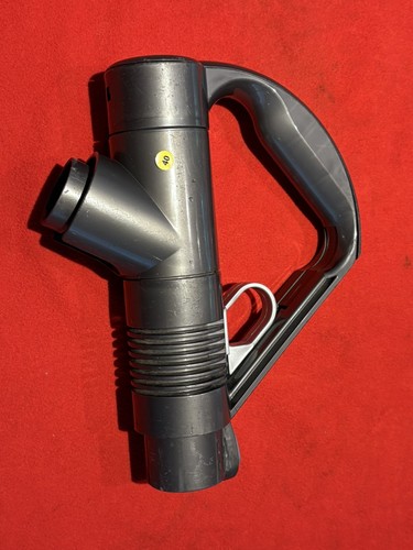 Poignée aspirateur traîneau