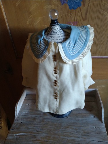 Splendide manteau poupée