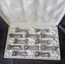 old box of 12 animal knives all different silver metal