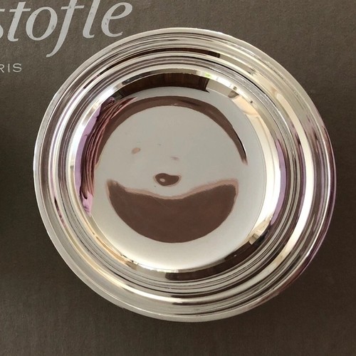 Une coupelle rince - coupelle, ou