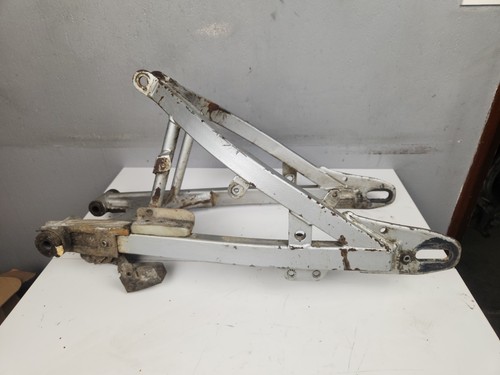 Bras oscillant monocross - oscillant,