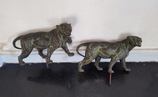 Paire de grands félins en