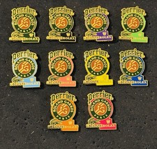 10 Pin’s Perrier Lacoste