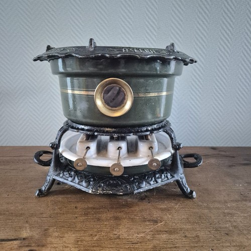 Ancien poêle pétrole - à,
