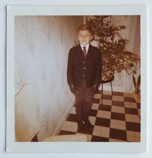 Boy poses in front Christmas tree costume tie - vintage photo snapshot