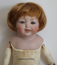 Perruque poupée ancienne