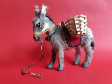 Ancienne figurine petit âne avec paniers plastique et fourrure