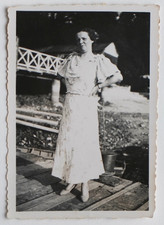 Woman long white dress, hands on hips - old photo snapshot