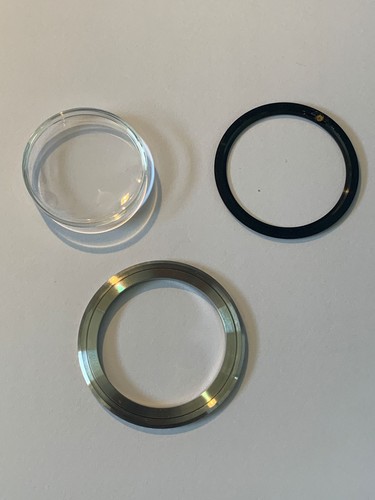 Bezel insert spring retainer - bezel,insert,spring,
