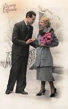 CP GOOD YEAR WOMAN BLONDE COAT COLLAR FUR AND ROSES MEN TIE