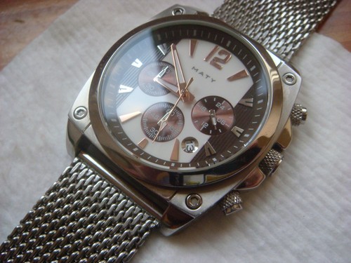 Tres belle montre chronographe