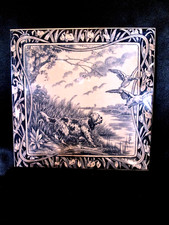 old blue faience tile of GIEN tiles scene hunting duck dog