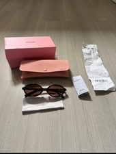 Lunettes de soleil MIU MIU