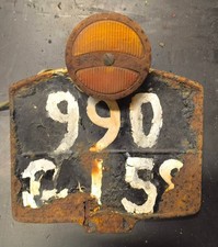 * feu arriere maly et plaque