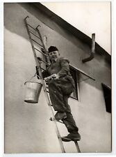 Portrait painter in building on a scale - old photo - year. 1950 60