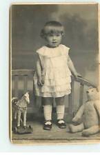 Toy - Girl Between Wooden Horse and Teddy Bear - Teddy Bear