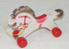 Antique wooden toy - small horse on wheels - 11 cm