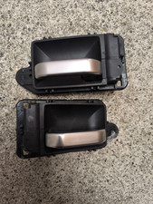 Interior handles left and right, Peugeot 205 and 106. Silver. Genuine Peugeot.