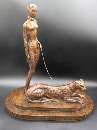 Erte femme à la - -,