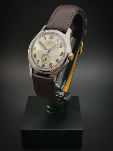 Montre lov mécanique ancienne - lov,