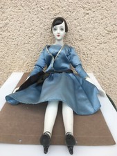 Ancienne poupée en céramique