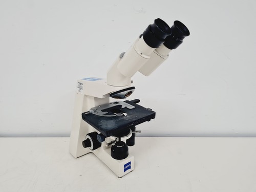 Microscope prisme - À,