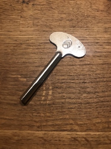 Clef nickelée pour - , les