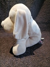 Doudou peluche chien assis