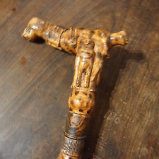 folk art wooden cane carved knob in the shape of various gargoyles