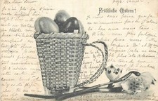 CP FROLHICHE OASTERN - WICKER BASKET FILLED WITH COLORED EGGS