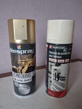 2 bombes de peinture blanc et