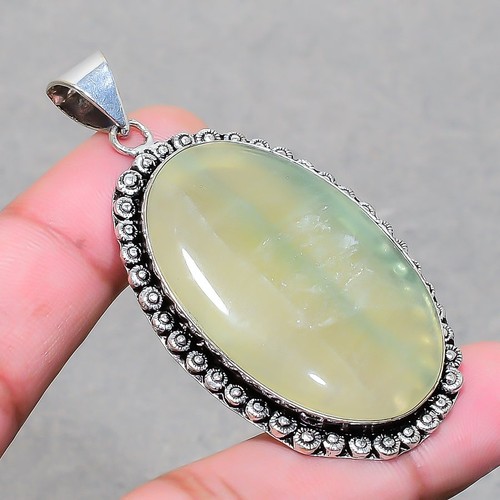 Pendentif bijoux fait - , main