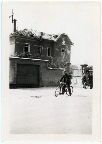 Man cycling front house - man,