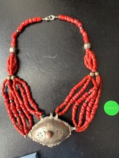 silver and coral amulet necklace