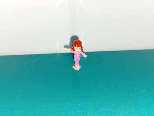 Polly pocket figurine doll