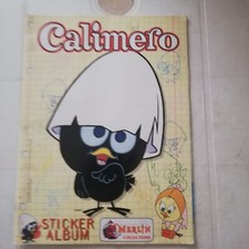 Calimero Merlin album complete with central poster, mint condition.