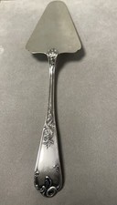 silver metal pie shovel / cake