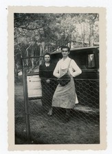 PHOTO SNAPSHOT, couple men in apron & bag in front of old car