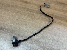 UN BOUTON DE DEMARRAGE COMMODO